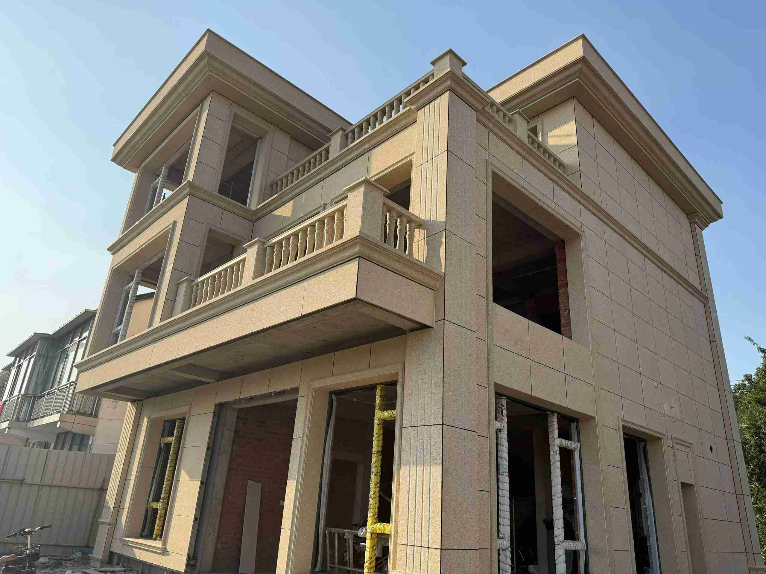 邯郸 黄金麻花岗岩石材荔枝面外墙干挂效果展示